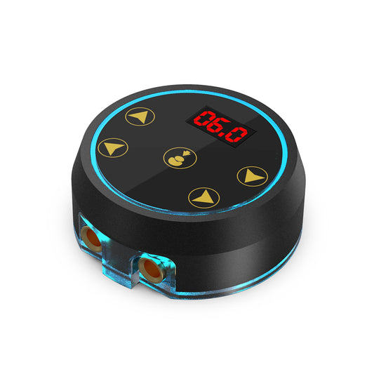 Tattoo Machine Power Supply With Intelligent Light. Black round unit with screen, blue light ring, and ports at the bottom.