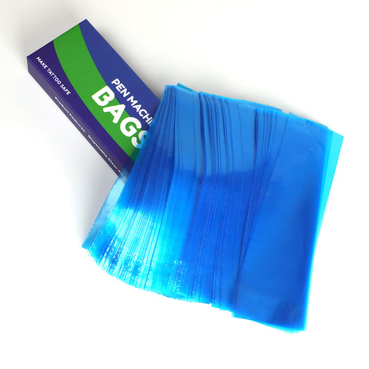 CNC Disposable Tattoo Machine Bags 100PCS. Green and blue box with a stack of blue transparent tattoo machine protective bags.