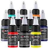 Multiple bottles of assorted colored tattoo inks: red, black, yellow, blue, etc.